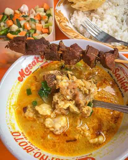 Soto Tangkar via IG @karawangfoodnotes, 1. Opak Ketan Rawagede, 2. Gegeplak Karawang, 3. Kue Ali Khas Karawang, 4. Kawista Madu, 5. Serabi Hijau, 6. Ikan Gabus Bumbu Pucung, 7. Soto Gempol, 8. Tahu Bambu, 9. Kue Gonjing, 10. Soto Sadang, 11. Soto Tangkar, 12. Nasi Liwet, 13. Ayam Goreng Sajolna, 14. Pepes Jambal, 15. Kerupuk Bontot, 16. Dodong Hideung, 17. Rengginang Ketan, 18. Bolu Kijing, 19. Jojongkong, 20. Gandasturi, 21. Kue Semprong, 22. Es Walikota, 23. Brownies Duren, 24. Telur Asin Bakar Batik, 25. Kue Lapis Tape, 26. Tahu Bumbu, 27. Pepes Walahar Khas Karawang