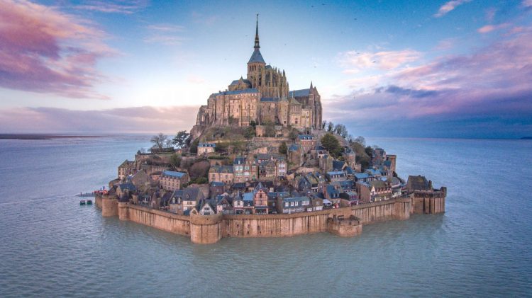 Mont Saint Michel via Bogseventravel, 1. Palace of Versailles, 2. Fontainebleau, 3. Sceaux, 4. Mont Saint Michel, 5. Saint-Germain-en-Laye, 6. Provins, 7. Chartres, 8. Reims, 9. Giverny, 10. Menara Eiffel, 11. Musee du Louvre, 12. Notre Dame de Paris, 13. Arc de Triomphe, 14. Champs-Élysées, 15. Sacré-Cœur, 16. Tuileries Garden, 17. Jardin du Luxembourg, 18. Montmartre, 19. Musée d’Orsay, 20. Disneyland Paris, 21. Place de la Concorde, 22. The Centre Pompidou, 23. Le Marais, 24. Champ de Mars, 25. Palais Garnier, 26. Montparnasse Tower, 27. Panthéon, 28. Rodin Museum, 29. Conciergerie, 30. Pont des Arts, 31. Musée de l’Orangerie, 32. Grand Palais, 33. La Villette