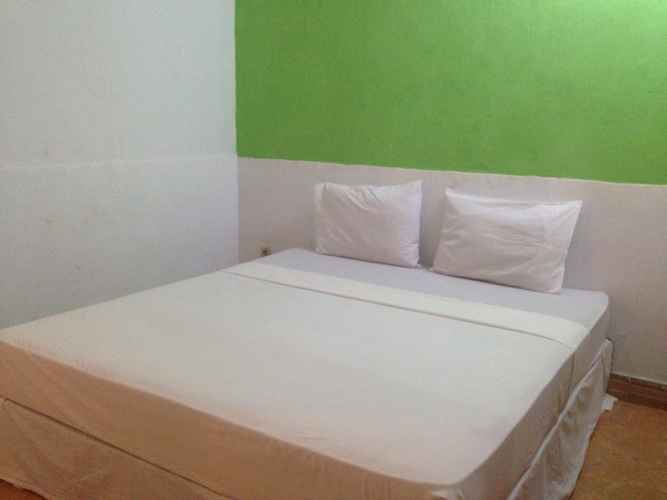 Suasana Hotel di Good For Ya Knee Hostel & Bungalows via Traveloka, 1. Good For Ya Knee Hostel & Bungalows, Akomodasi Murah Meriah Berjarak 5 Menit Jalan Kaki dari Pantai, 2. Budget Kaki Lima Tapi Ingin Akomodasi dengan Privasi Lebih? Angel’s Cottage Jawabannya, 3. Menginap dalam Suasana Eco Friendly yang Ramah Budget Bisa Kalian Dapatkan di Little Woodstock Homestay, 4. Oceane Paradise Bungalow, Cocok Bagi Kalian yang Ingin Menginap Nyaman dengan Harga Hemat, 5. Kalian Juga Dapat Mempertimbangkan Giliano Residence untuk Pilihan Akomodasi Budget nan Nyaman, 6. Ingin Menjauh Sejenak dari Peradaban Modern Tanpa Harus Jauh-jauh dari Pusat Keramaian? Coba Lirik Denaya Lodge, deh!, 7. Gili Bagaz Cottage Hadir Untuk Kalian yang Merindukan Nuansa Etnik Jawa dengan Harga Budget, 8. Walau Rate-nya Terbilang Budget, Fasilitas di Trawangan Oasis Hotel Ini Cukup Lengkap Untuk Memanjakan Wisatawan, 9. Hotel Vila Ombak, 10. Natya Hotel Gili Trawangan, 11. The Trawangan Resort, 12. Pearl of Trawangan, 13. Santorini Beach Resort, 14. Mango Dive & Bungalow