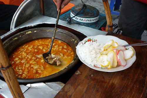 Gulai Tikungan Blok M via Indonesiagoid, 1. Sate Kambing H. Giyo, Jatinegara, 2. Sop Kaki Kambing Dudung Roxy, Kalibata, 3. Nasi Goreng Kambing Kebon Sirih, 4. Gulai Tikungan Blok M, 5. Sate Tongseng Pak Budi Pondok Bambu, 6. Kambing Bakar Cairo, Senopati, 7. Sop Kaki Kambing Estu Rame, Tebet, 8. Raja Kambing Guling, 9. Kambing Guling Haji Ishak, 10. Kaum Jakarta, 11. Mouton Slice & Grill, 12. Roemah Rempah, 13. Bakaraloka, 14. Namaaz Dining, 15. Kambing Guling Kanye