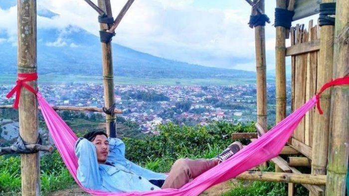 Puncak Rindu Kayu Aro vi Tribun Travel, 1. Air Terjun Pancuran Rayo, 2. Danau Kaco, 3. Perkebunan Teh Kayu Aro, 4. Puncak Rindu Kayu Aro (Tutup), 5. Air Panas Semurup, 6. Goa Kasah, 7. Danau Kerinci, 8. Gunung Kerinci, 9. Rawa Bento, 10. Air Terjun Talang Kemulun, 11. Danau Gunung Tujuh, 12. Danau Lingkat