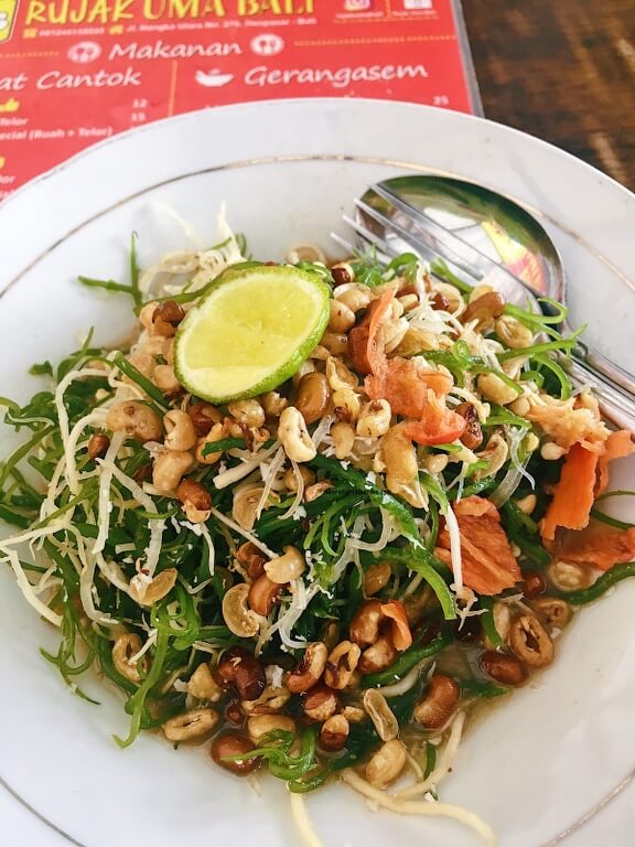 Rujak uma bali (Denpasar), 1. Warung Babi Ibu Oka, 2. Naughty Nuri’s, 3. Pawon Pasundan, 4. Cafe Pomegranate, 5. Monkeys Cuisine, 6. Green Ginger (Tutup), 7. Betelnut Cafe, 8. Petitenget, 9. Restoran Rondji, 10. Restoran L’Assiette (Tutup), 11. Nook (Kerobokan), 12. Ultimo Italian Restaurant (Kerobokan), 13. Pison Coffee (Kerobokan), 14. Biku (Kerobokan), 15. Lawn Canggu, 16. Potato Head (Kerobokan), 17. Finns beach Club (Canggu), 18. La Plancha (Seminyak), 19. Ulu Cliffhouse (Pecatu), 20. KYND COMMUNITY (Kerobokan), 21. Warung Mak Beng (Sanur), 22. Gusto Gelato (Seminyak), 23. Massimo Restaurant (Sanur), 24. RivaReno Gelato Bali (Kerobokan), 25. Yogurt Republic (Seminyak), 26. Nalu Bowls (Pecatu), 27. Waroeng Kampoeng (Jimbaran), 28. Warung Nasi Ayam Bu Oki (Jimbaran), 30. Warung Kayu Manis (Denpasar), 31. Warung Men Gara (Mengwi), 32. Warung Nasi Tekor Bali (Denpasar), 33. Warung makan nikmat halal (Kuta), 34. Rujak uma bali (Denpasar), 35. Pronto Pizza (Kuta), 36. Pink Tempong (Kuta), 37. Donat Lio (Denpasar), 38. Waroeng Soerabi Bandoeng 101 (Kuta), 39. Ronde Nusa Kambangan (Denpasar), 40. Gado Gado Ibu Lulu (Kerobokan), 41. Mie Bandung (Denpasar), 42. Warung Bunana, 44. Ulekan, 45. Sinamon Bali, 46. Cuca Restaurant, 47. Folie Kitchen & Pâtisserie, 48. Yogurt Republic, 49. Vincent Nigita Patisserie, 50. Sayuri Healing Food, 51. Nasi Campur Warung Mek Juwel, 52. Confiture de Bali, 53. Zest Ubud, 54. Yogurt Yogi, 55. Sawobali Cake & Coffee Shop, 56. Bella by Sage, 57. The Amora Bali Restaurant, 58. D’ Alas Warung, 59. The Wijaya Kusuma, 60. Café Seafood Bakar Jimbaran, 61. Ngiring Ngwedang, 62. Mentari Restoran Bedugul, 63. Restoran Bebek Tepi Sawah Ubud, 64. The Lookout Resto & Bar, 65. The Kelusa, 66. Wantilan Resataurant, 67. Bali Buda, 68. Samani Resto, 69. The Sayan House, 70. Swept Away, 71. El Kabron, 72. Ke-Pi-Tu, 73. CasCades Restaurant