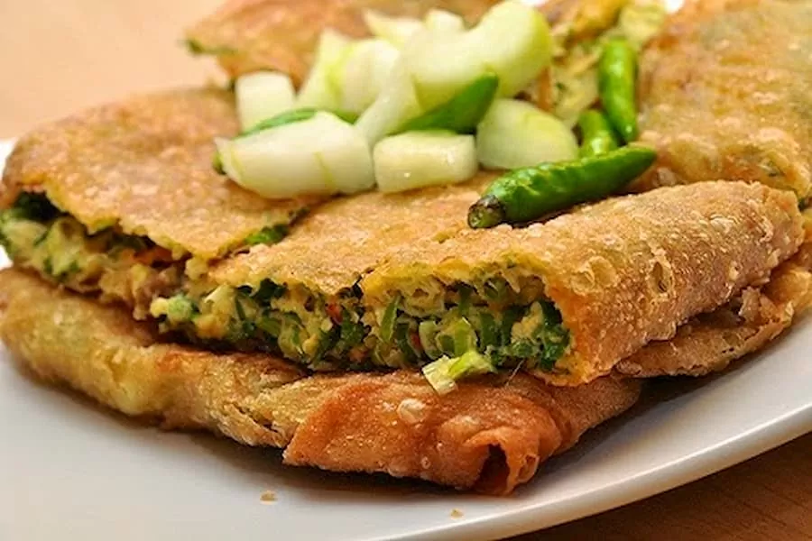 Martabak Lebaksiu - oleh-oleh Khas Tegal, 1. Kacang Bogares , 2. Pilus Kletuk, 3. Manisan khas Guci, Cerme, 4. Kerupuk Antor , 5. Latopia/Latopnya , 6. Poci Tanah Liat , 7. Kaos Galgil, 8. Mug Tanah Liat, 9. Tahu Aci, 10. Kue Kamir, 11. Keripik Tahu, 12. Gemblong Ocar – Acir, 13. Olos, 14. GuCheez, 15. Kue Tempel, 16. Telur Asin, 17. Teh Khas Tegal, 18. Rempeyek, 19. Dodol Tegal, 20. Martabak Lebaksiu, 21. Glotak, 22. Tahu Pletok