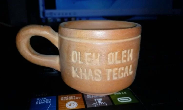 Mug Tanah Liat via Bukalapak, 1. Kacang Bogares , 2. Pilus Kletuk, 3. Manisan khas Guci, Cerme, 4. Kerupuk Antor , 5. Latopia/Latopnya , 6. Poci Tanah Liat , 7. Kaos Galgil, 8. Mug Tanah Liat, 9. Tahu Aci, 10. Kue Kamir, 11. Keripik Tahu, 12. Gemblong Ocar – Acir, 13. Olos, 14. GuCheez, 15. Kue Tempel, 16. Telur Asin, 17. Teh Khas Tegal, 18. Rempeyek, 19. Dodol Tegal, 20. Martabak Lebaksiu, 21. Glotak, 22. Tahu Pletok