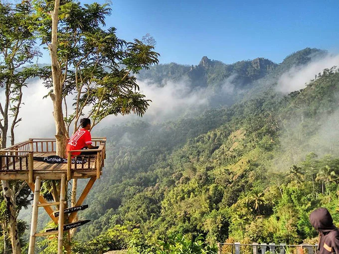 Sukmojoyo Hill, 1. Candi Borobudur, 2. Rafting di Sungai Progo Atas, 3. Alun-alun Kota Magelang, 4. Air Terjun Kedung Kayang, 5. Taman Kyai Langgeng, 6. Ketep Pass, 7. Air Terjun Sekar Langit, 8. Rumah Kamera, 9. Candi Mendut, 10. Candi Pawon, 11. Gunung Andong, 12. Candi Selogriyo, 13. Gunung Tidar, 14. Curug Grenjengan Kembar, 15. Punthuk Setumbu, 16. Trekking Gunung Merbabu, 17. Curug Silawe, 18. Pemandian Air Hangat Candi Umbul, 19. Taman Badaan, 20. Museum Sudirman, 21. Pinusan Kragilan Magelang, 22. Candi Canggal, 23. Candi Ngawen, 24. Candi Lumbung, 25. Pemandian Kali Bening, 26. Air Terjun Kedung Kayangan, 27. Gardu Pandang Babadan, 28. Arung Jeram Kali Elo, 29. Telaga Bleder, 30. Gardu Pandang Bukit Barede, 31. Gardu Pandang Dlimas, 32. Gardu Pandang Mangli, 33. Sukmojoyo Hill, 34. Hutan Pinus Grenden, 35. Gereja Ayam di Dusun Gombong, 36. Punthuk Setumbu, 37. Kedung Sembrani, 38. Gunung Telomoyo, 39. Silancur Highland, 40. Bukit Grenden, 41. Curug Sigetik, 42. Puntuk Mangir Gunung Payung, 43. Bukit Rhema, 44. Hutan Pinus Wisata Mangli, 45. Jurang Jero, 46. OHD Museum, 47. Gunung Giyanti, 48. Curug Watu Ploso, 49. Klenteng Liong Hok Bio, 50. Curug Gleyor, 51. Punthuk Mongkrong, 52. Bukit Sleker, 53. Curug Lawang Kori, 54. Bukit kertojoyo, 55. Taman Ramadanu, 56. Puncak Seoloyo, 57. Taman Wisata Kopeng, 58. Bukit Gancik Selo Boyolali, 59. Gunung Sumbing, 60. Punthuk Kendil, 61. Bukit Harapan Cuntel, 62. Kebun Durian Candimulyo, 63. Jembatan Gantung Mangunsuko, 64. Air Terjun Goa Slandak, 65. Air Terjun Sumuran, 67. Museum Kapal Samudraraksa, 68. Karesidenan Kedu, 69. New Selo, 70. Taman Dewari, 71. Desa Wisata Candirejo, 72. Svargabumi Borobudur, 73. Awang-awang Telomoyo, 74. Ladon Little Island, 75. Candi Retno, 76. Wisata Petik Salak Gapoktan Ngudi Luhur, 77. Pesona Cempurung, 78. Gardu Pandang Cepogo, 79. Taman Garempong Bringin Kulon, 80. Sendang Mudal, 81. Curug Dlimas, 82. Museum Diponegoro, 83. Curug Sikencling, 84. Sendang Maren, 85. Citraelo Rafting, 86. Desa Wisata Ngawen, 87. Wisata Kulon Ndeso, 88. Taman Bunga Matahari, 89. Taman Hanya Untukmu, 90. Junkyard Autopark & Cafe, 91. Balkondes Ngadiharjo, 92. Banyuroto, 93. Bukit Dagi, 94. Jembatan Gantung Srowol, 95. Candi Asu, 96. Persawahan Permitan, 97. Bakorwil II Magelang, 98. Kebun Bibit Senopati