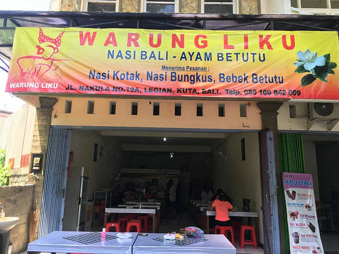 Warung Liku 23 Tempat Wisata Kuliner di Bali Paling Legendaris &amp; Terbaik, Enak, 1. Sop Ikan Mak Beng Sanur, 2. Warung Mami, 3. Warung Wardani, 4. Sate Plecing Arjuna, 5. Warung D’Sawah, 6. Sanur Night Market, 7. Warung Nyoman, 8. Nasi Ayam Kedewatan Ibu Mangku, 9. Bebek Bengil Crispy Duck – Nusa Dua, 10. MamaSan Bali, 11. Nasi Pedas Bu Andika, 12. Rujak Kuah Pindang Bu Putu, 13. Revolver Espresso, 14. Seniman Coffee, 15. Bebek Goreng Laka Leke, 16. Warung Nasi Bali Men Weti (Sanur), 17. Naughty Nuri’s Warung, 18. Ayam Betutu Men Tempeh Gilimanuk, 19. Warung Laota, 20. Warung Bebek Tepi Sawah, 21. Sate Babi Bawah Pohon (Kuta), 22. Nasi Pecel Bu Tinuk, 23. Warung Liku