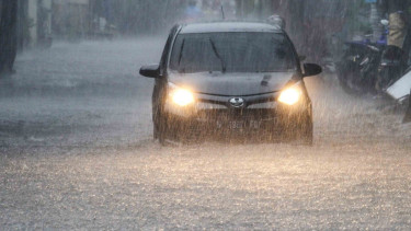 Hujan lebat dan banjir (ilustrasi)