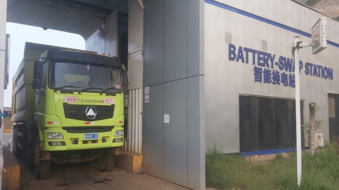 Truk EV pengangkut material nikel di IMIP sedang mengganti baterai, Kawasan Indonesia Morowali Industrial Park (IMIP), Klaster Pengolahan Nikel, Proses pengolahan bijih nikel di smelter IMIP Morowali, Hilirisasi dan Jargon K3, Proses pengolahan pig iron di PT Denxin Steel di kawasan IMIP, Stainless Steel Berkualitas Tinggi, Gulungan stainless steel dari olahan nikel di kawasan IMIP Morowali, Truk EV pengangkut material nikel di IMIP sedang mengganti baterai, Klaster Baterai EV dan Rahasia Produksi