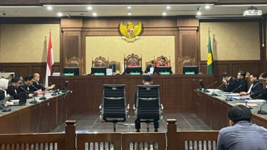 Sidang pembacaan surat dakwaan kasus dugaan suap terhadap putusan lepas