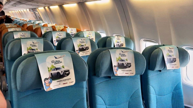 Kabin Garuda Indonesia dengan livery Sky Explorer Mitsubishi Destinator