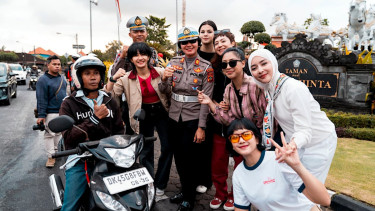 Kampanye keselamatan berkendara komunitas pemotor perempuan.