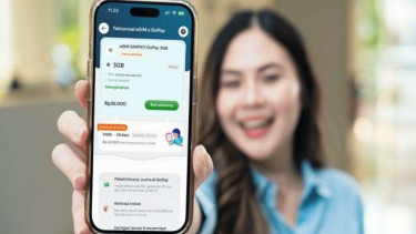 Kerja sama Gopay dan Telkomsel.