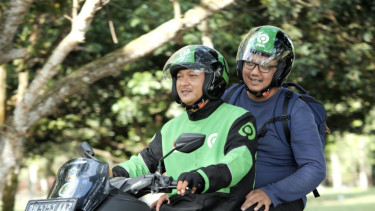 Gojek melayani pelanggan dengan pelayanan terbaik