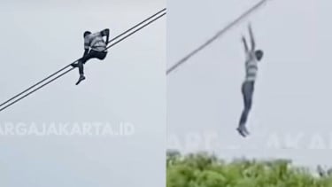 Tangkapan layar seorang pria nekat bergelantung di kabel udara Jl Gatot Subroto