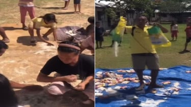 Warga di Tapanuli Utara mengais beras campur tanah dari bantuan dilempar Heli