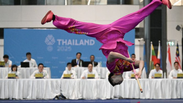 Atlet Wushu Edgar Xavier Marvelo beraksi pada final wushu taolu putra SEA Games