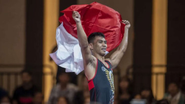 Pegulat Indonesia Muhammad Aliansyah Raih Medali Emas