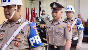 Bripda Muhammad Seili (tengah) anggota Polres Banjarbaru