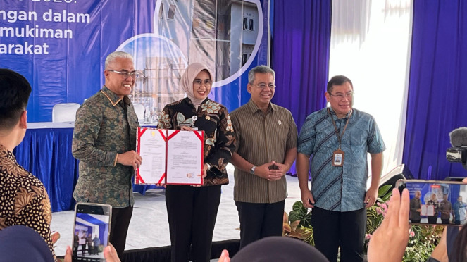 Penandangan Nota Kesepahaman (MoU) pengembangan UMKM melalui penguatan ekosistem pembiayaan dan pemberdayaan UMKM.