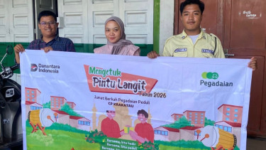 Pegadaian melakukan program Mengetuk Pintu Langit di Medan
