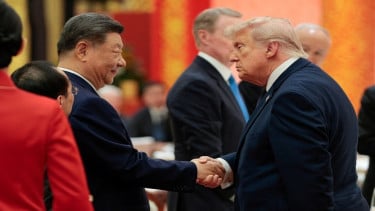 Presiden AS Donald Trump bersama Presiden China Xi Jinping di Beijing