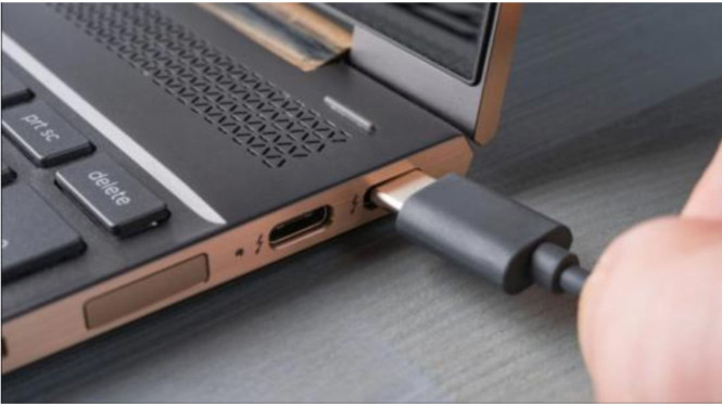 Ilustrasi laptop dicas