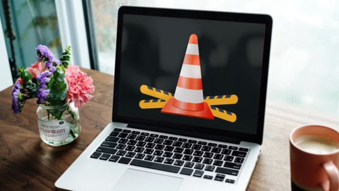 Ilustrasi VLC media player ngelag, 1. Spesifikasi Laptop Kurang Memadai, 2. Terlalu Banyak Aplikasi yang Berjalan, 3. Driver Kartu Grafis Belum Diupdate, 4. Pemutar Video Tidak Kompatibel, 5. File Video Rusak atau Format Tidak Cocok, 6. Hard Disk atau SSD Bermasalah, 7. Koneksi Internet Lemah (Khusus Video Online)
