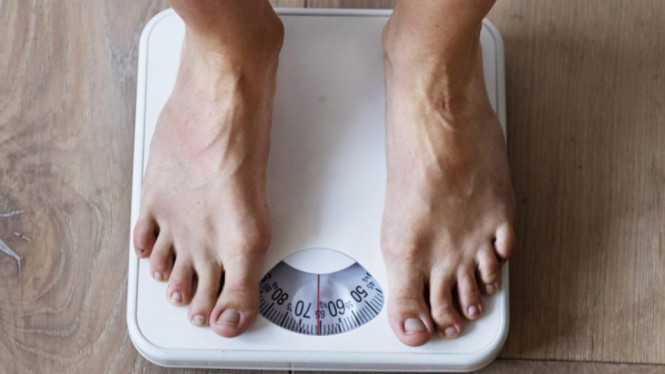 Ilustrasi berat badan.