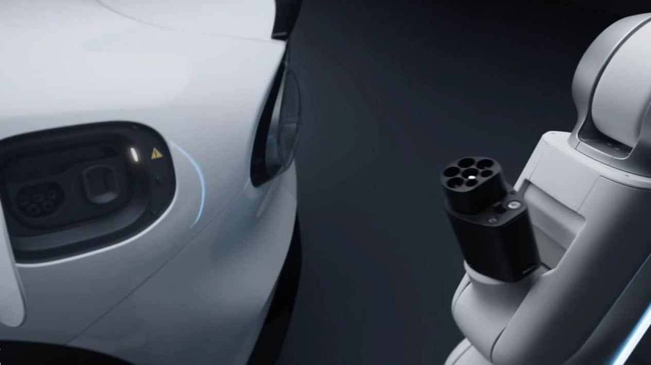 Xiaomi Robotic Arm for charging, Lengan Robotik yang Ringkas dan Mudah Dikendalikan, Xiaomi Robotic Arm for charging, Melengkapi Portofolio Pengisian Daya Rumah Xiaomi, Xiaomi EV robotic arm for charging, Visi Xiaomi dalam Otomasi Pengisian Daya EV, Potensi Ketersediaan dan Harga di Indonesia