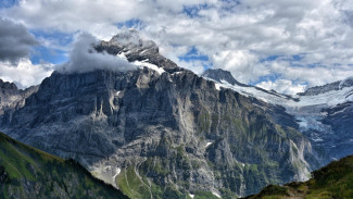 Pegunungan Alpen Swiss, 1. Denmark: Negara dengan Kesejahteraan Sosial Terbaik, Ilustrasi kerja di Denmark, 2. Norwegia: Keindahan Alam dan Keamanan Tinggi, 3. Finlandia: Pendidikan dan Lingkungan yang Unggul, 4. Islandia: Stabilitas Sosial dan Keindahan Vulkanik, 5. Swiss: Kemakmuran Ekonomi dan Lanskap Pegunungan, Pegunungan Alpen Swiss, Tips Perjalanan ke Negara Sejahtera