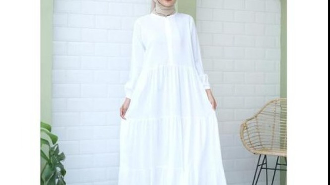 Ilustrasi gamis katun adem, Kenali Jenis-Jenis Katun Favorit untuk Gamis, Model Gamis Katun yang Cocok untuk Sehari-Hari, Tips Memilih Gamis Katun yang Adem dan Nyaman, Perpaduan Hijab dan Aksesori untuk Tampilan Stylish