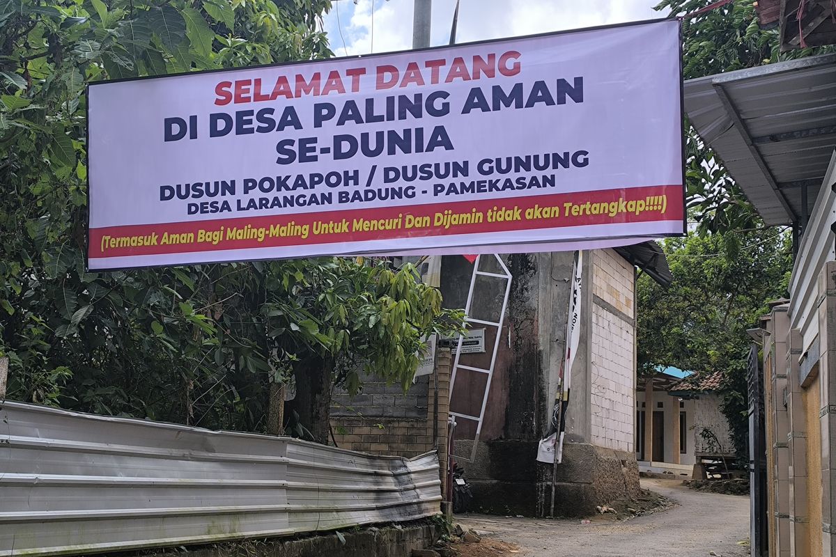 Surabaya, Jawa Timur, Pamekasan, Polres Pamekasan, Desa maling, Kasus Spanduk Desa Maling Pamekasan, Kasus Spanduk 