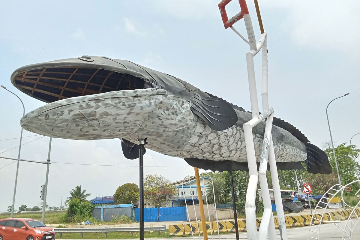 tugu ikan gabus bekasi, tugu ikan gabus tambun, Patung Ikan Gabus di Tambun Utara, Patung Ikan Gabus viral, Patung Ikan Gabus Viral Jadi Ikon Tambun Utara, Swadaya Warga Urunan Rp 2,5 Juta