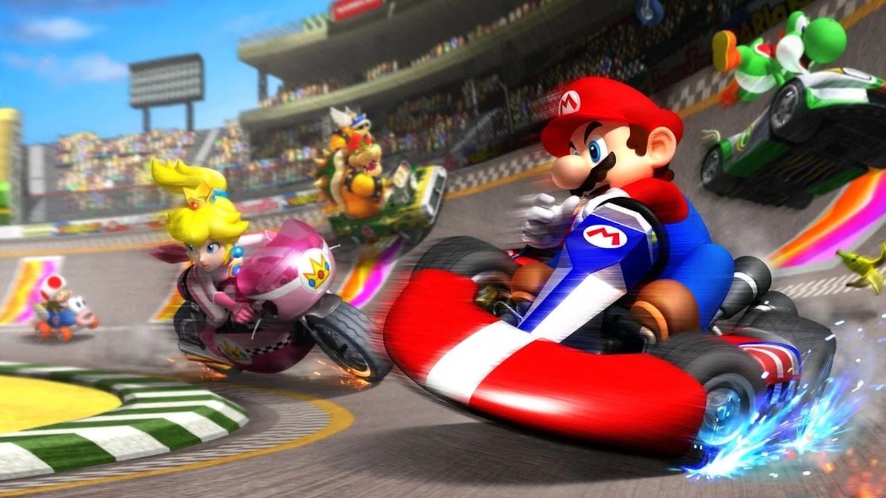 11. Mario Kart: Super Circuit, 10. Mario Kart Tour, 9. Super Mario Kart, 8. Mario Kart 64, 7. Mario Kart 7, 6. Mario Kart Wii, 5. Mario Kart 8, 4. Mario Kart DS, 3. Mario Kart World, 2. Mario Kart: Double Dash!!, 1. Mario Kart 8 Deluxe