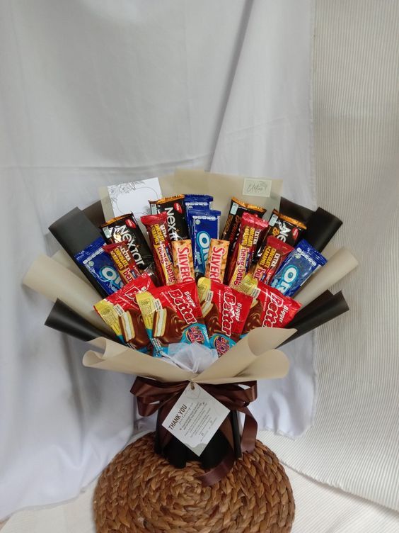 12 Contoh Buket Snack Simpel dan Murah, Tapi Beri Kesan Mewah, 1. Buket Snack Serba Pink, 2. Buket Snack Aneka Coklat, 3. Buket Snack Wafer Roll Coklat, 4. Buket Snack Pink Hitam, 5. Buket Snack Lilac dan Biru Muda, 6. Buket Snack Serba Ungu, 7. Buket Snack Jumbo, 8. Buket Snack Sederhana, 9. Buket Snack Biru Hitam, 10. Buket Snack Murah Meriah, 11. Buket Snack Serba Hijau, 12. Buket Snack Ungu Hitam