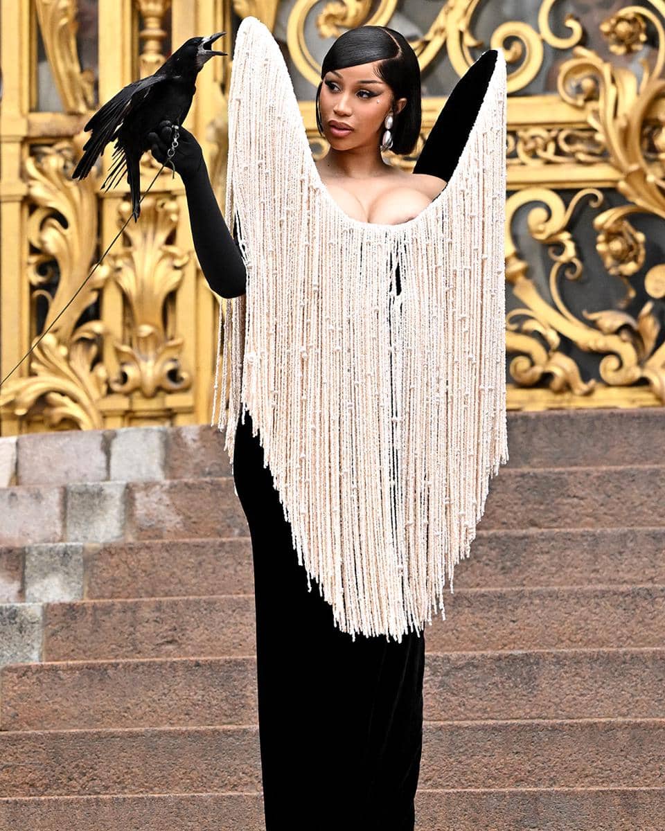 Bringing the 𝘿𝙍𝘼𝙈𝘼 to #ParisFashionWeek...#CardiB!🐦_⬛🖤✨️ The “Up” rapper brought a real c.jpg, 1. Dua Lipa, 2. Hunter Schafer, 3. Karol G, 4. Heart Evangelista, 5. Cardi B