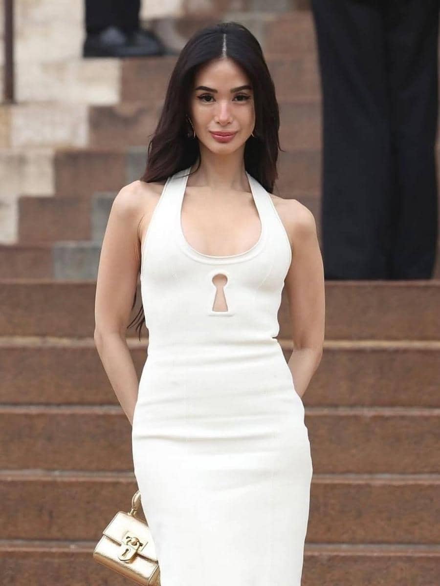 Only at @schiaparelli @iamcardib shows up with a raven, and the runway delivers a crystal heart.heic, 1. Dua Lipa, 2. Hunter Schafer, 3. Karol G, 4. Heart Evangelista, 5. Cardi B