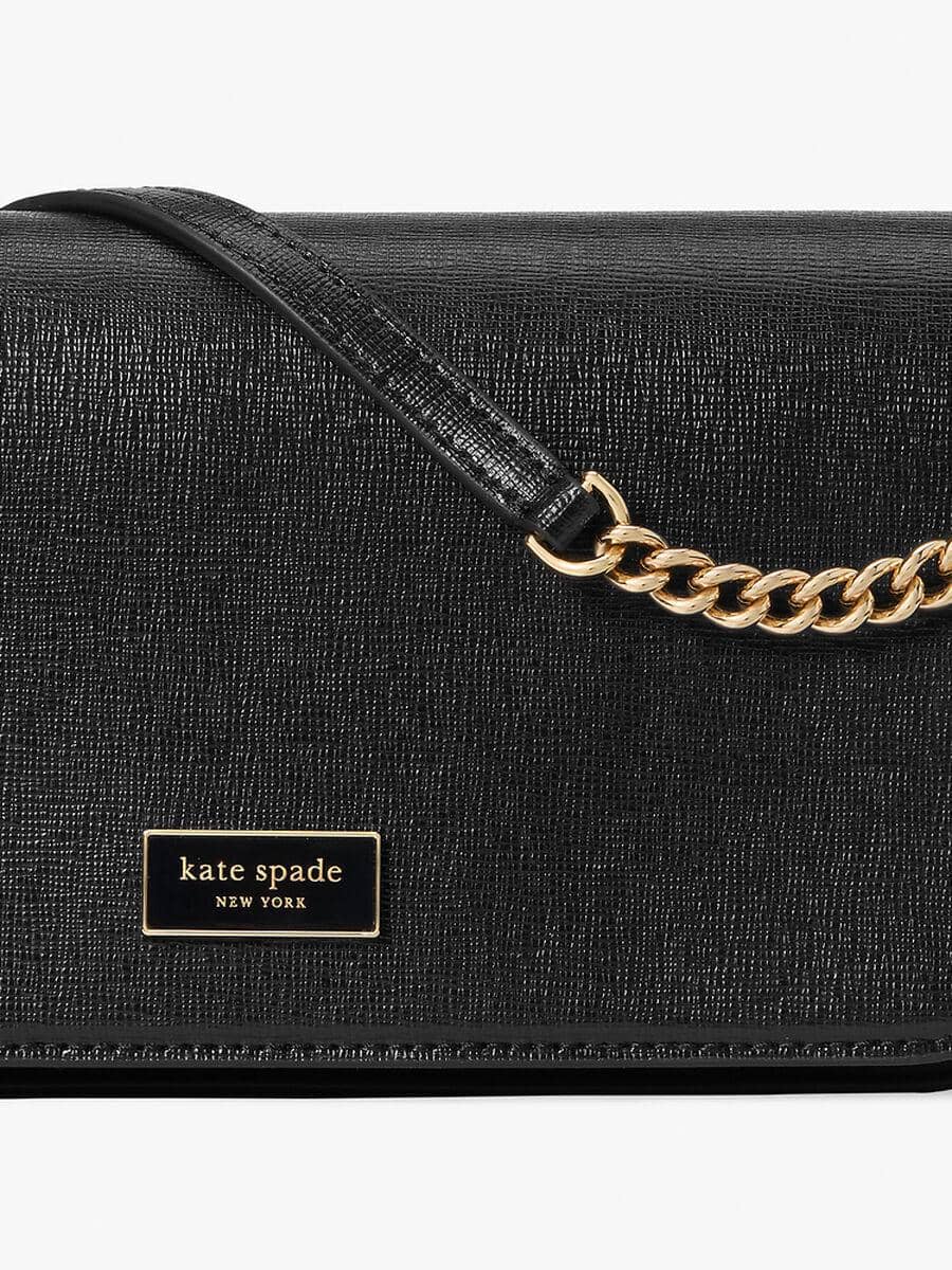 katespade.comau.jpg, 1. Tas Kate Spade asli dibuat dengan material premium, 2. Memiliki hardware berkualitas yang kuat, tidak berkarat, dan halus, 3. Ada logo label yang dijahit di dalam tas, 4. Tas Kate Spade asli memiliki care cards sebagai petunjuk perawatan tas, 5. Cara membedakan tas Kate Spade asli VS. palsu 