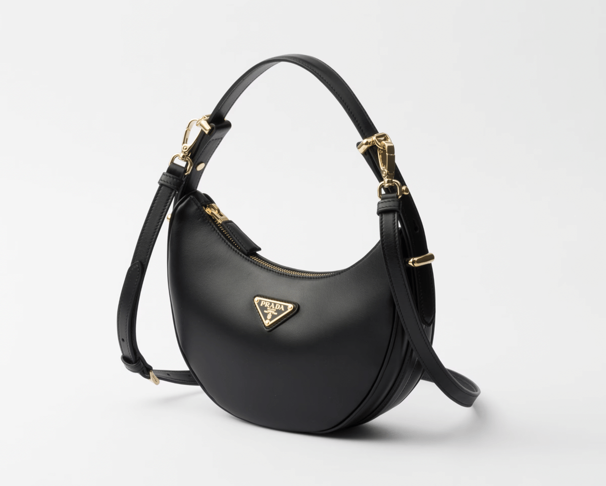 prada.com, 1. Small Prada Galleria Saffiano Leather Bag, 2. Prada Arqué Small Leather Shoulder Bag, 3. Prada Re-Edition 2005 Re-Nylon Bag, 4. Prada Cleo Brushed Leather Shoulder Bag, 5. Prada Aimée Leather Shoulder Bag