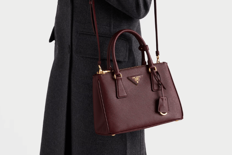 prada.com, 1. Small Prada Galleria Saffiano Leather Bag, 2. Prada Arqué Small Leather Shoulder Bag, 3. Prada Re-Edition 2005 Re-Nylon Bag, 4. Prada Cleo Brushed Leather Shoulder Bag, 5. Prada Aimée Leather Shoulder Bag