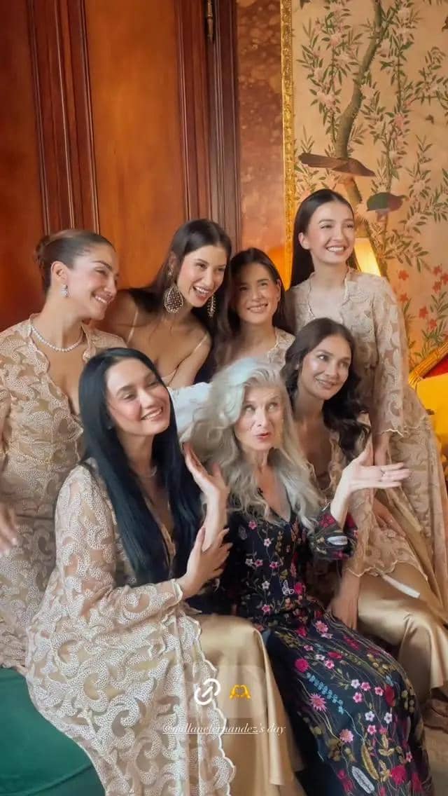 2507394-luna-raline-bridesmaid.jpg, 1. Luna Maya hadir sebagai salah satu bridesmaids di pernikahan Millane Fernandez yang digelar di Italia. Ia pakai dress bernuansa dusty pink., 2. Gaun tersebut memiliki korset fit body yang menonjolkan siluet ramping. Ada detail kerutan di bagian pinggang dengan aksen lace sebagai layer. , 3. Para bridesmaids pengantin juga kompak mengenakan lace robe yang dipadukan dengan slip dress berbahan satin warna gold, termasuk Luna Maya., 4. Dengan tatanan rambut wavy, Luna Maya tampak cantik dan glowing saat mengenakan robe dan dress satin warna gold yang memancarkan auranya., 5. Sejumlah sahabat diundang ke Italia untuk menjadi bridesmaids termasuk Luna Maya dan Raline Shah yang berpose bersama pengantin.