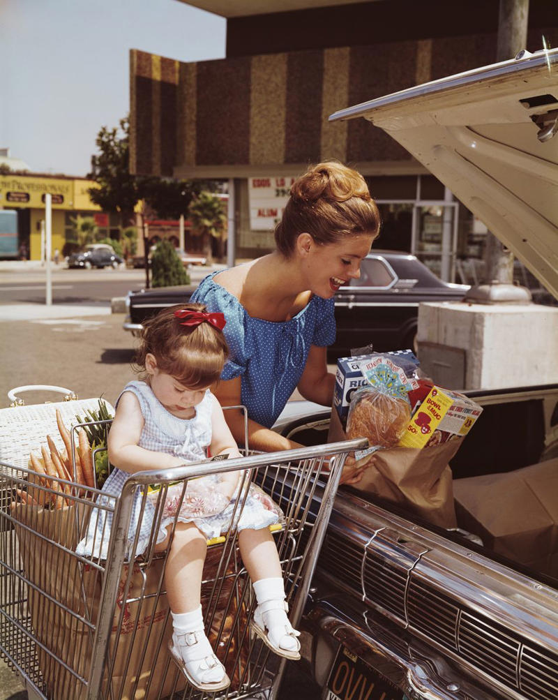 Circa 1960s: Don't Forget the Candy 1) 1915: General Store for Locals, 3) Circa 1930s: Prices by the Bargain, 6) 1945: Grocery Cart Strollers, 7) Circa 1950: Kroger Expands, 8) Circa 1950s: A Place to Socialize, 10) 1956: The Soda Bar, 11) 1956: A Family Shopping Outing, 12) Circa 1960s: Stores Start Getting Larger, 13) Circa 1960s: The Evolution of the Grocery Bag, 14) Circa 1960s: Don't Forget the Candy, 15) Circa 1960s: Bag it Up, 16) Circa 1960s: Countless Checkout Counters, 17) 1962: The Original Curbside Pickup, 18) 1968: Shopping Carts for the Mid-Century Modern Era, 19) 1968: Underground Markets, 21) 1976: Grand Opening, 22) 1980s: Big-Box is Here to Stay, 23) 1985: The Manhattan Grocery Store, 24) 1995: Kids in the Shopping Cart, 26) Circa 1990s: Don't Forget the CD Section, 27) 1990: Grocery Shopping Made Easy, 28) 1996: Sales! Sales! Sales!