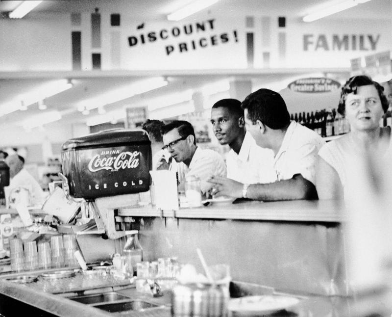 1956: The Soda Bar 1) 1915: General Store for Locals, 3) Circa 1930s: Prices by the Bargain, 6) 1945: Grocery Cart Strollers, 7) Circa 1950: Kroger Expands, 8) Circa 1950s: A Place to Socialize, 10) 1956: The Soda Bar, 11) 1956: A Family Shopping Outing, 12) Circa 1960s: Stores Start Getting Larger, 13) Circa 1960s: The Evolution of the Grocery Bag, 14) Circa 1960s: Don't Forget the Candy, 15) Circa 1960s: Bag it Up, 16) Circa 1960s: Countless Checkout Counters, 17) 1962: The Original Curbside Pickup, 18) 1968: Shopping Carts for the Mid-Century Modern Era, 19) 1968: Underground Markets, 21) 1976: Grand Opening, 22) 1980s: Big-Box is Here to Stay, 23) 1985: The Manhattan Grocery Store, 24) 1995: Kids in the Shopping Cart, 26) Circa 1990s: Don't Forget the CD Section, 27) 1990: Grocery Shopping Made Easy, 28) 1996: Sales! Sales! Sales!