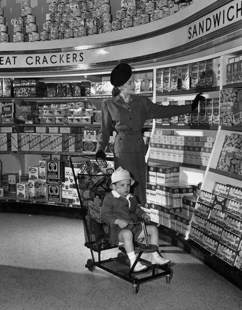 1945: Grocery Cart Strollers 1) 1915: General Store for Locals, 3) Circa 1930s: Prices by the Bargain, 6) 1945: Grocery Cart Strollers, 7) Circa 1950: Kroger Expands, 8) Circa 1950s: A Place to Socialize, 10) 1956: The Soda Bar, 11) 1956: A Family Shopping Outing, 12) Circa 1960s: Stores Start Getting Larger, 13) Circa 1960s: The Evolution of the Grocery Bag, 14) Circa 1960s: Don't Forget the Candy, 15) Circa 1960s: Bag it Up, 16) Circa 1960s: Countless Checkout Counters, 17) 1962: The Original Curbside Pickup, 18) 1968: Shopping Carts for the Mid-Century Modern Era, 19) 1968: Underground Markets, 21) 1976: Grand Opening, 22) 1980s: Big-Box is Here to Stay, 23) 1985: The Manhattan Grocery Store, 24) 1995: Kids in the Shopping Cart, 26) Circa 1990s: Don't Forget the CD Section, 27) 1990: Grocery Shopping Made Easy, 28) 1996: Sales! Sales! Sales!