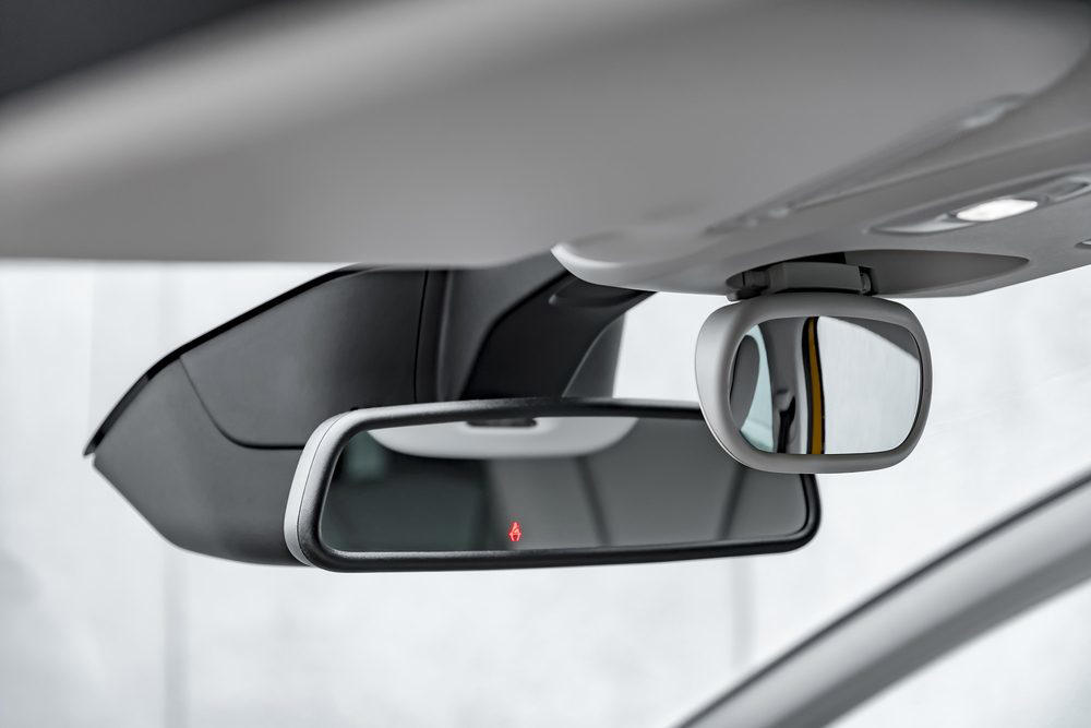 15 Weird Car Features You Didn’t Know You Might Have Blind-spot monitoring, Back-seat reminders, Modern car driver and child rear-view mirror, Conversation mirror, Smartphone integration, Drowsiness detector, Adaptive cruise control, Tire pressure monitoring systems