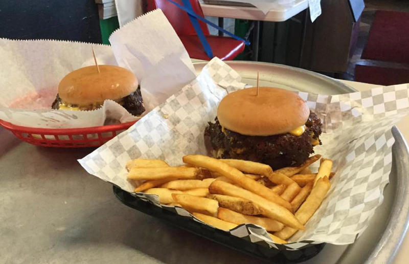 Indiana: Smash burger, Workingman’s Friend, Indianapolis 54. Tennessee: Dyer's Single, Dyer's Burgers, Memphis, 53. Alabama: hamburger, Dub's Burgers, Athens, 52. Connecticut: The Original Burger, Louis' Lunch, New Haven, 51. California: Steakburger, The Apple Pan, Los Angeles, 50. Iowa: hamburger, B-Bops, various locations, 49. Maine: hamburger, Black Cow, Portland, 48. New Jersey: hamburger, White Manna, Hackensack, 47. New Hampshire: hamburger, Gilley’s Diner, Portsmouth, 46. Massachusetts: Hamburg, White Hut, West Springfield, 45. California: hamburger, In-N-Out Burger, various locations, 44. District of Columbia: Farmhouse Burger, Good Stuff Eatery, Georgetown, 43. Mississippi: Slugburger, Latham's Hamburger Inn, New Albany, 42. Utah: Big Ben, Burger Bar, Roy, 41. Wisconsin: hamburger, Sobelman's Pub & Grill, Milwaukee, 40. Wyoming: The Liberty Burger, Liberty Burger, Jackson, 39. Illinois: House-blend prime beef burger, Butcher & The Burger, Chicago, 38. Arizona: The Standard at The Stand Arcadia Burger Shoppe, Phoenix, 37. Colorado: Cricket Burger, The Cherry Cricket, Denver, 36. New York: Luger burger, Peter Luger Steakhouse, New York City, 35. Delaware: FTC, Farmer & the Cow, Wilmington, 34. Minnesota: Jucy Lucy, Matt’s Bar, Minneapolis, 33. Pennsylvania: hamburger, M2O Burgers & Salads, Philadelphia, 32. South Carolina: Classic, Big Gun Burger Shop, Charleston, 31. Idaho: The Classic, Holy Cow!, Nampa, 30. Kansas: House Burger, Dempsey's Burger Pub, Wichita, 29. Missouri: hamburger, Town Topic, Kansas City, 28. Nebraska: The Original, Cheeseburgers, Omaha, 27. New Mexico: Rustic, Rustic On The Green, Albuquerque, 26. Indiana: Smash burger, Workingman’s Friend, Indianapolis, 25. Vermont: Worthy Burger, Worthy Burger, South Royalton and Woodstock, 24. Arkansas: traditional hamburger, Hugo's, Fayetteville, 23. Texas: Tookie's Burger, Tookie's Hamburgers & More, Kemah, 22. Nevada: Plain Jane, Beefy's, Reno, 21. Georgia: Green Truck Classic, Green Truck Pub, Savannah, 20. New York: hamburger, All-American Hamburger Drive-In, Massapequa, 19. North Dakota: Carport, Sickies Garage Burgers & Brews, various locations, 18. Michigan: sliders, Motz’s Burgers, Detroit, 17. Michigan: Ground Round, Miller’s Bar, Dearborn, 16. Florida: hamburger, Mac's Drive-Thru, Gainesville, 15. West Virginia: Oscar, Oscar’s Breakfast, Burgers & Brews, Barboursville, 14. North Carolina: hamburger, Brooks’ Sandwich House, Charlotte, 13. Kentucky: The Purist, Bard's Burgers & Chili, Covington, 12. Maryland: Hamburger, Burger Bros., Towson, 11. Oklahoma: single onion burger, Tucker's Onion Burgers, various locations, 10. Rhode Island: Stanley Burger, Stanley’s Famous Hamburgers, Central Falls, 9. Virginia: Beauvine, Beauvine Burger Concept, Richmond, 8. Oregon: The Original 100, Hwy 101 Burger, Lincoln City, 7. Ohio: hamburger, Kewpee Hamburgers, Lima, 6. Hawaii: hamburger, Kua Aina Sandwich Shop, Haleiwa, 5. Alaska: The Burger Stop, Tommy's Burger Stop, Anchorage, 4. Montana: Hamburger, The Burger Drive, Billings, 3. Washington: Seattle Classic, Von's 1000 Spirits, Seattle, 2. Louisiana: Butcher Burger, Cochon Butcher, New Orleans
