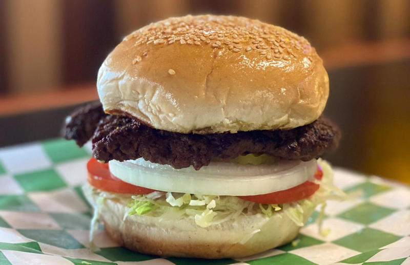 Texas: Tookie's Burger, Tookie's Hamburgers & More, Kemah 54. Tennessee: Dyer's Single, Dyer's Burgers, Memphis, 53. Alabama: hamburger, Dub's Burgers, Athens, 52. Connecticut: The Original Burger, Louis' Lunch, New Haven, 51. California: Steakburger, The Apple Pan, Los Angeles, 50. Iowa: hamburger, B-Bops, various locations, 49. Maine: hamburger, Black Cow, Portland, 48. New Jersey: hamburger, White Manna, Hackensack, 47. New Hampshire: hamburger, Gilley’s Diner, Portsmouth, 46. Massachusetts: Hamburg, White Hut, West Springfield, 45. California: hamburger, In-N-Out Burger, various locations, 44. District of Columbia: Farmhouse Burger, Good Stuff Eatery, Georgetown, 43. Mississippi: Slugburger, Latham's Hamburger Inn, New Albany, 42. Utah: Big Ben, Burger Bar, Roy, 41. Wisconsin: hamburger, Sobelman's Pub & Grill, Milwaukee, 40. Wyoming: The Liberty Burger, Liberty Burger, Jackson, 39. Illinois: House-blend prime beef burger, Butcher & The Burger, Chicago, 38. Arizona: The Standard at The Stand Arcadia Burger Shoppe, Phoenix, 37. Colorado: Cricket Burger, The Cherry Cricket, Denver, 36. New York: Luger burger, Peter Luger Steakhouse, New York City, 35. Delaware: FTC, Farmer & the Cow, Wilmington, 34. Minnesota: Jucy Lucy, Matt’s Bar, Minneapolis, 33. Pennsylvania: hamburger, M2O Burgers & Salads, Philadelphia, 32. South Carolina: Classic, Big Gun Burger Shop, Charleston, 31. Idaho: The Classic, Holy Cow!, Nampa, 30. Kansas: House Burger, Dempsey's Burger Pub, Wichita, 29. Missouri: hamburger, Town Topic, Kansas City, 28. Nebraska: The Original, Cheeseburgers, Omaha, 27. New Mexico: Rustic, Rustic On The Green, Albuquerque, 26. Indiana: Smash burger, Workingman’s Friend, Indianapolis, 25. Vermont: Worthy Burger, Worthy Burger, South Royalton and Woodstock, 24. Arkansas: traditional hamburger, Hugo's, Fayetteville, 23. Texas: Tookie's Burger, Tookie's Hamburgers & More, Kemah, 22. Nevada: Plain Jane, Beefy's, Reno, 21. Georgia: Green Truck Classic, Green Truck Pub, Savannah, 20. New York: hamburger, All-American Hamburger Drive-In, Massapequa, 19. North Dakota: Carport, Sickies Garage Burgers & Brews, various locations, 18. Michigan: sliders, Motz’s Burgers, Detroit, 17. Michigan: Ground Round, Miller’s Bar, Dearborn, 16. Florida: hamburger, Mac's Drive-Thru, Gainesville, 15. West Virginia: Oscar, Oscar’s Breakfast, Burgers & Brews, Barboursville, 14. North Carolina: hamburger, Brooks’ Sandwich House, Charlotte, 13. Kentucky: The Purist, Bard's Burgers & Chili, Covington, 12. Maryland: Hamburger, Burger Bros., Towson, 11. Oklahoma: single onion burger, Tucker's Onion Burgers, various locations, 10. Rhode Island: Stanley Burger, Stanley’s Famous Hamburgers, Central Falls, 9. Virginia: Beauvine, Beauvine Burger Concept, Richmond, 8. Oregon: The Original 100, Hwy 101 Burger, Lincoln City, 7. Ohio: hamburger, Kewpee Hamburgers, Lima, 6. Hawaii: hamburger, Kua Aina Sandwich Shop, Haleiwa, 5. Alaska: The Burger Stop, Tommy's Burger Stop, Anchorage, 4. Montana: Hamburger, The Burger Drive, Billings, 3. Washington: Seattle Classic, Von's 1000 Spirits, Seattle, 2. Louisiana: Butcher Burger, Cochon Butcher, New Orleans