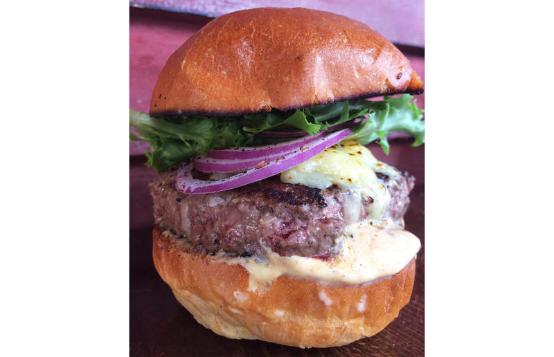 Vermont: Worthy Burger, Worthy Burger, South Royalton and Woodstock 54. Tennessee: Dyer's Single, Dyer's Burgers, Memphis, 53. Alabama: hamburger, Dub's Burgers, Athens, 52. Connecticut: The Original Burger, Louis' Lunch, New Haven, 51. California: Steakburger, The Apple Pan, Los Angeles, 50. Iowa: hamburger, B-Bops, various locations, 49. Maine: hamburger, Black Cow, Portland, 48. New Jersey: hamburger, White Manna, Hackensack, 47. New Hampshire: hamburger, Gilley’s Diner, Portsmouth, 46. Massachusetts: Hamburg, White Hut, West Springfield, 45. California: hamburger, In-N-Out Burger, various locations, 44. District of Columbia: Farmhouse Burger, Good Stuff Eatery, Georgetown, 43. Mississippi: Slugburger, Latham's Hamburger Inn, New Albany, 42. Utah: Big Ben, Burger Bar, Roy, 41. Wisconsin: hamburger, Sobelman's Pub & Grill, Milwaukee, 40. Wyoming: The Liberty Burger, Liberty Burger, Jackson, 39. Illinois: House-blend prime beef burger, Butcher & The Burger, Chicago, 38. Arizona: The Standard at The Stand Arcadia Burger Shoppe, Phoenix, 37. Colorado: Cricket Burger, The Cherry Cricket, Denver, 36. New York: Luger burger, Peter Luger Steakhouse, New York City, 35. Delaware: FTC, Farmer & the Cow, Wilmington, 34. Minnesota: Jucy Lucy, Matt’s Bar, Minneapolis, 33. Pennsylvania: hamburger, M2O Burgers & Salads, Philadelphia, 32. South Carolina: Classic, Big Gun Burger Shop, Charleston, 31. Idaho: The Classic, Holy Cow!, Nampa, 30. Kansas: House Burger, Dempsey's Burger Pub, Wichita, 29. Missouri: hamburger, Town Topic, Kansas City, 28. Nebraska: The Original, Cheeseburgers, Omaha, 27. New Mexico: Rustic, Rustic On The Green, Albuquerque, 26. Indiana: Smash burger, Workingman’s Friend, Indianapolis, 25. Vermont: Worthy Burger, Worthy Burger, South Royalton and Woodstock, 24. Arkansas: traditional hamburger, Hugo's, Fayetteville, 23. Texas: Tookie's Burger, Tookie's Hamburgers & More, Kemah, 22. Nevada: Plain Jane, Beefy's, Reno, 21. Georgia: Green Truck Classic, Green Truck Pub, Savannah, 20. New York: hamburger, All-American Hamburger Drive-In, Massapequa, 19. North Dakota: Carport, Sickies Garage Burgers & Brews, various locations, 18. Michigan: sliders, Motz’s Burgers, Detroit, 17. Michigan: Ground Round, Miller’s Bar, Dearborn, 16. Florida: hamburger, Mac's Drive-Thru, Gainesville, 15. West Virginia: Oscar, Oscar’s Breakfast, Burgers & Brews, Barboursville, 14. North Carolina: hamburger, Brooks’ Sandwich House, Charlotte, 13. Kentucky: The Purist, Bard's Burgers & Chili, Covington, 12. Maryland: Hamburger, Burger Bros., Towson, 11. Oklahoma: single onion burger, Tucker's Onion Burgers, various locations, 10. Rhode Island: Stanley Burger, Stanley’s Famous Hamburgers, Central Falls, 9. Virginia: Beauvine, Beauvine Burger Concept, Richmond, 8. Oregon: The Original 100, Hwy 101 Burger, Lincoln City, 7. Ohio: hamburger, Kewpee Hamburgers, Lima, 6. Hawaii: hamburger, Kua Aina Sandwich Shop, Haleiwa, 5. Alaska: The Burger Stop, Tommy's Burger Stop, Anchorage, 4. Montana: Hamburger, The Burger Drive, Billings, 3. Washington: Seattle Classic, Von's 1000 Spirits, Seattle, 2. Louisiana: Butcher Burger, Cochon Butcher, New Orleans