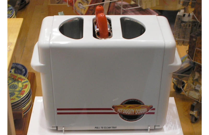 Hot dog maker 29. Microwave egg poacher, 28. Garlic crusher, 27. Electric juicer, 26. Meat-shredding claws, 25. Electric egg boiler, 24. Salad spinner, 23. Yolk separator, 22. Burger press, 21. Hot dog maker, 20. Electric can opener, 19. Avocado keepers, 18. Yogurt maker, 17. Herb keeper, 16. Mandoline slicer, 15. Breakfast sandwich maker, 14. Whipped cream dispenser, 13. Herb scissors, 12. Spiralizer, 11. Strawberry huller, 10. Fancy cocktail set, 9. Electric kitchen knife, 8. Bacon press, 7. Popcorn maker, 6. Electric salt and pepper grinders, 5. Cupcake/muffin maker, 4. Carrot sharpener, 3. Melon baller, 2. Pizza scissors