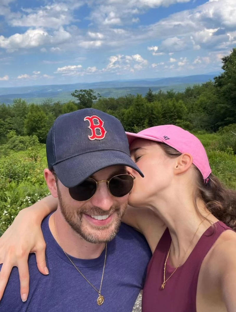 Alba Baptista is a 28-year-old Portuguese actress., She and Chris Evans were first rumored to be dating in 2021., Evans and Baptista had two weddings in 2023., The pair welcomed their first child, daughter Alma, in October 2025., Evans shared his biggest tribute to Baptista on Valentine’s Day 2023., Evans first spoke about Baptista in a September 2023 GQ interview., Friends made rare comments about their relationship in March 2025., Evans opened up about his proposal to Baptista in June 2025.